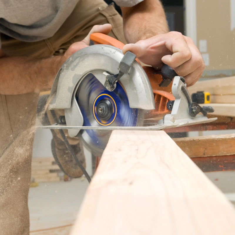 man working with wood